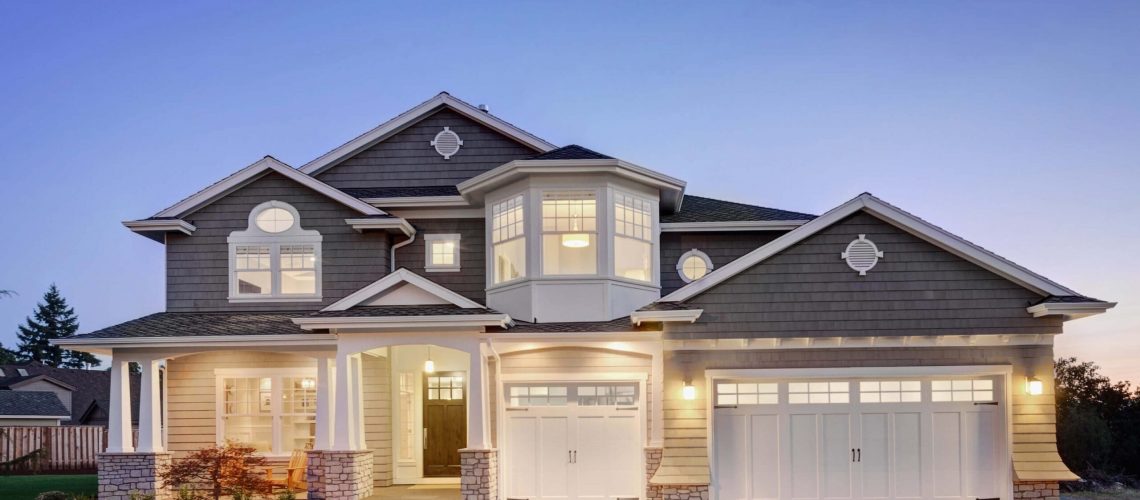A brightly lit home with a large garage
